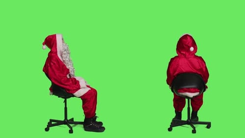 Santa Sits on Office Chair Green Screen