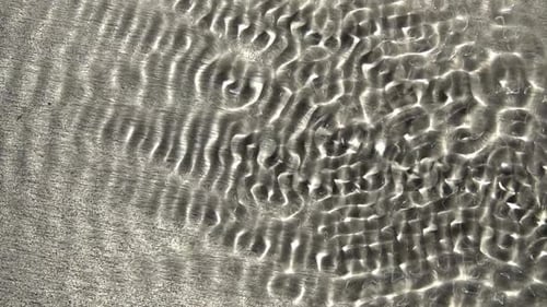 Abstract Ripples of Water Creating Light Patterns