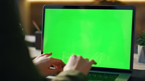 Manager Hands Typing on Greenscreen Laptop at Office Desk Close Up. Unknown
