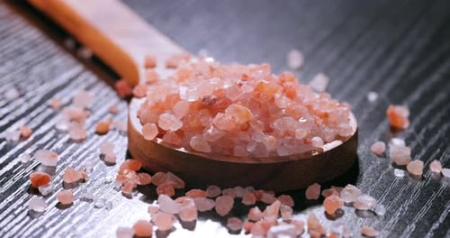 Pink Himalayan Salt in Wooden Spoon Close-Up