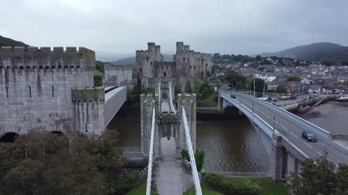 Conwy castle railway bridge suspension construction engineering architecture aerial rising view
