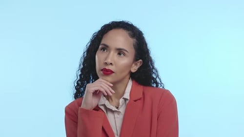 Business woman, thinking and studio by blue background for ideas, vision