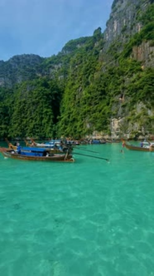 Longtail Boats at Pileh Lagoon Koh Phi Phi Maya Bay Thailand the Turquoise Colored Ocean