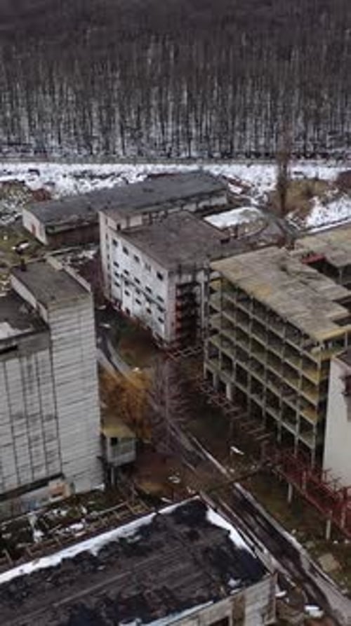 Damaged industrial plant. Old factory with abandoned buildings
