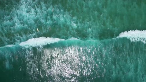 Surfers in Bali - Indonesia.