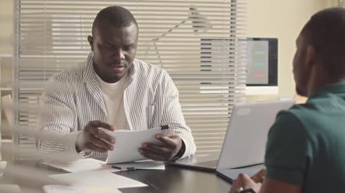 Candidate Giving Resume to Employer