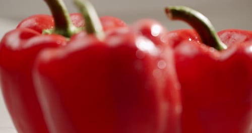 Close Up of Wet Red Bell Peppers