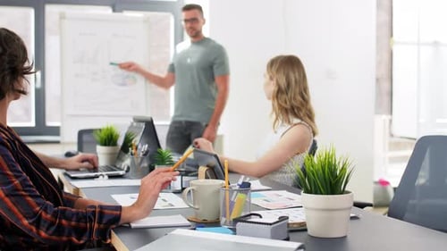 Business, People And Corporate Concept - Team Of Startuppers Or Ui Designers Working At Office