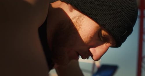 Focused Athlete Training Outdoors in Sunlight