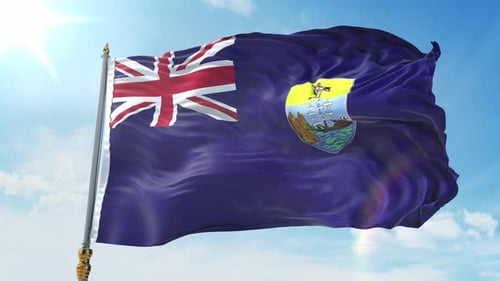 St. Helena Flag Waving on Flagpole with Blue Sky