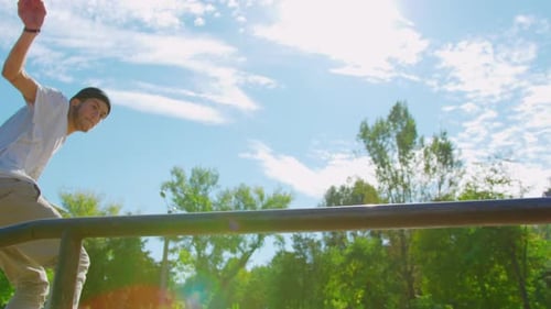 Skateboarding Tricks in the Park on a Sunny Day