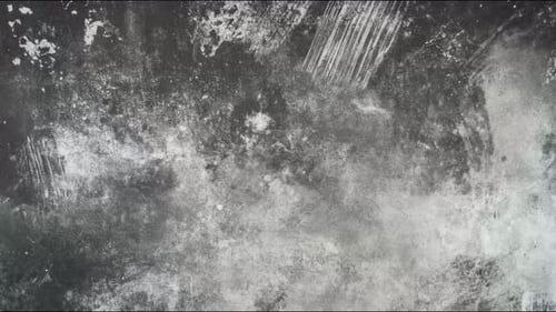 Grunge textured wall dust and scratches slowly drifting across dark industrial backdrop seamless loo
