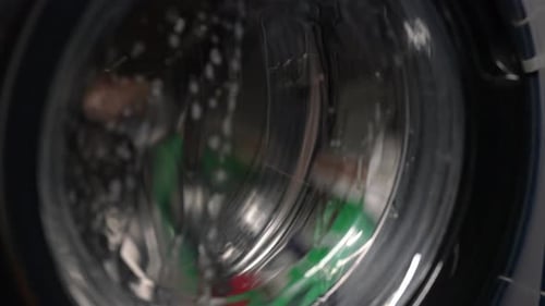 Clothes Spinning Inside a Washing Machine