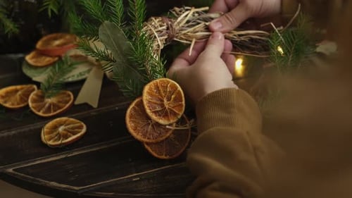 Crafting a Christmas Wreath with Dried Oranges