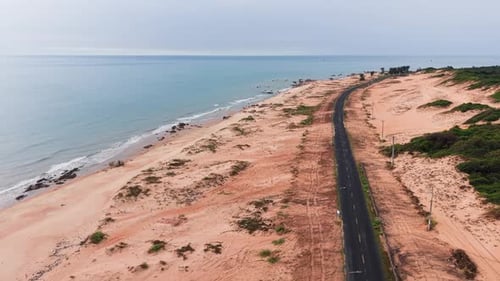 Aerial View Jib of the Beach and the Road.