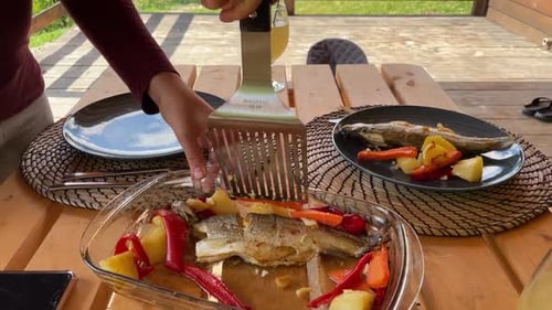 Preparing a traditional romanian fish dish