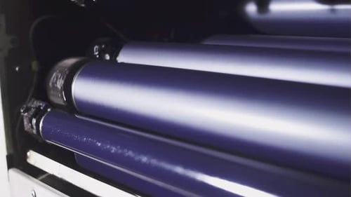 Rotating Indigo Rollers in an Industrial Printing Machine