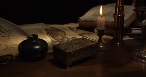 Vintage Desk with Candlelight and Antique Accessories