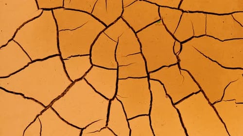 Cracked Soil in a Desert Drying Out in Timelapse. Ground Draining, Cracked Earth, Global Warming