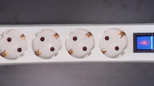 Plugging and Unplugging Cord from Surge Protector