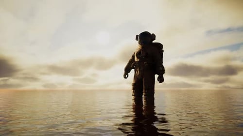Spaceman in the Sea Under Clouds at Sunset