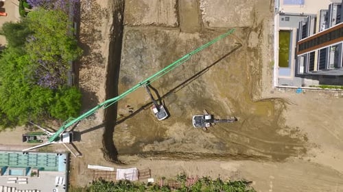 Aerial View Starting Construction Heavy Equipment Lays First Concrete