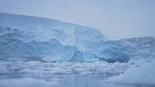 Antarctica Blue Glacier with Ice Close Up Detail, Sea Ice and Ocean Water Landscape Scenery, Low Ang