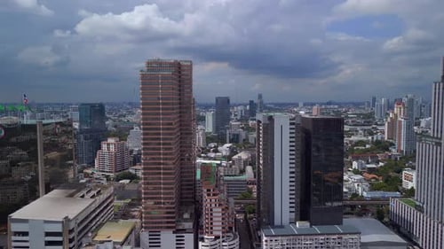 Cloudy sky over skyscrapers. Spectacular aerial view flight
Bangkok District modern ari, thailand 2