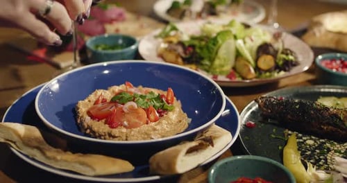 Close Up of a Middle Eastern Dish with Bread