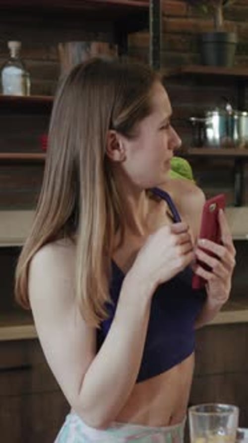 Fit Woman Drinking Juice with Her Partner