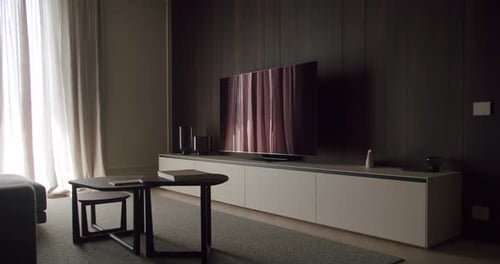 Modern living room interior with television and furniture