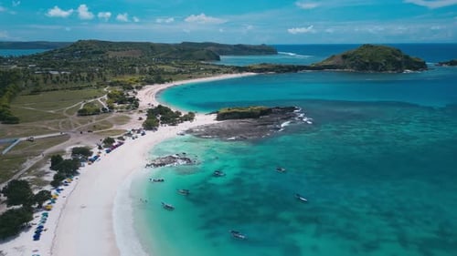 Aerial Perspective Revealing Vibrant Seas And Rocky Formations