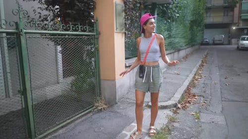 Chic Urban Walk A Stylish Young Woman Wearing a Beautiful Casual Outfit As She Enjoys the City