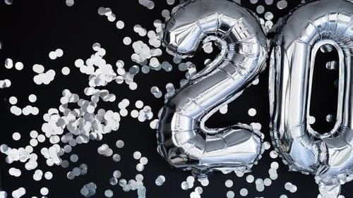 Silver Balloons Spell Twenty-Five with Confetti