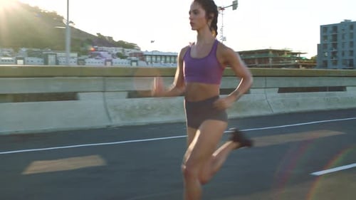 Running, fitness and runner workout of a woman training in a city street