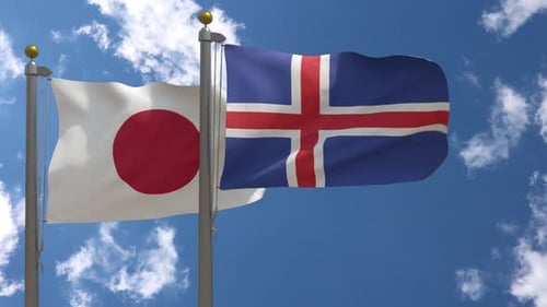 Japan and Iceland Flags Waving in Blue Sky