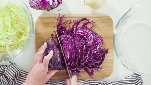 Preparing Colorful Cabbage on Wood Cutting Board