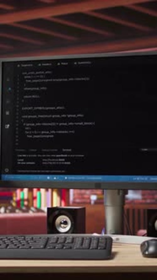 Vertical Video Empty Modern Apartment Room with Coding Application on PC Screen