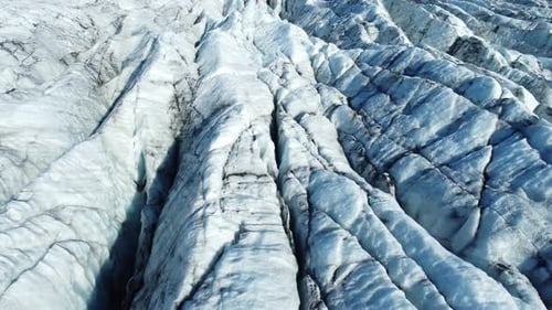 Aerial View of Glacier in Iceland Beautiful Nature Landscape Flying Over Blue Ice in Mountains