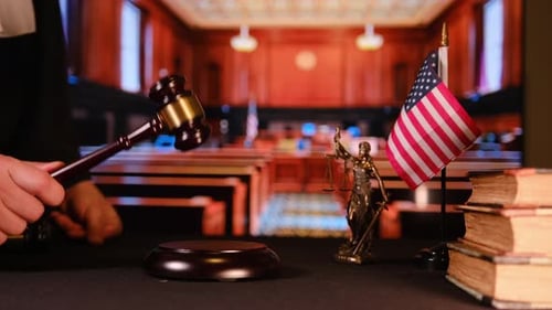 Judge Hitting Gavel in American Courtroom