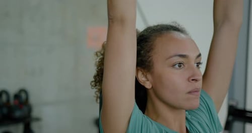 Adult Female Weights Training in Gym