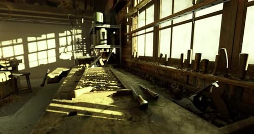 Sunlight Filters Through Windows in a Woodworking Shop Filled with Tools