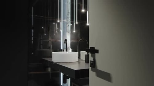 Modern sink and vanity with stylish pendant lighting