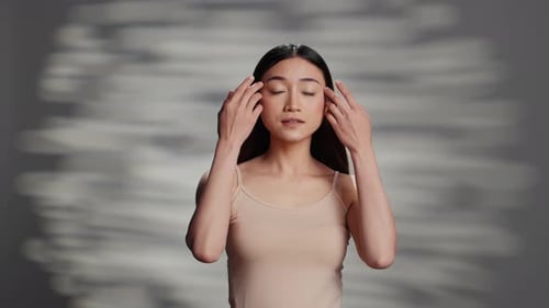 Cheerful Smiling Woman with Bare Skin Posing in Studio