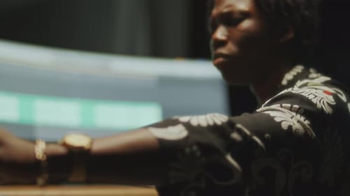 African American Musician Recording New Track in Audio Studio