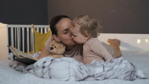 Mother and Child Reading Book Together