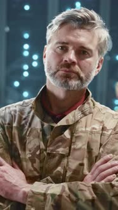 Military Army Portrait Mature Caucasian Soldier in Camouflage Crossing Arms Posing at Server Racks