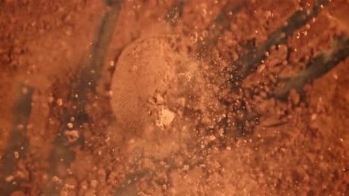 Cocoa Powder Falls on the Table Filmed on a Highspeed Camera at 1000 Fps