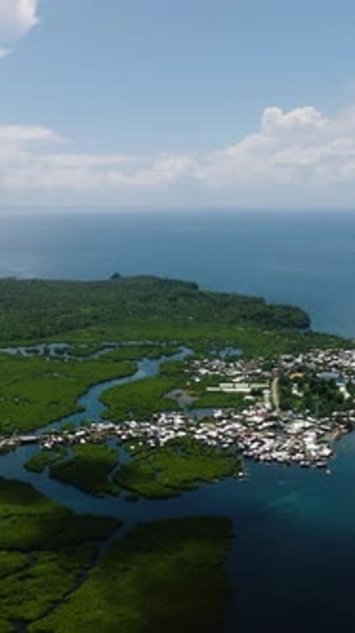 Coastal Town Surrounded By Mangroves and Blue Sea Siargao Philippines
