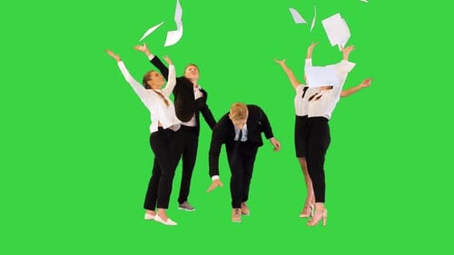 Young Friends in Office Suits Throw Away Boring Documents and Start Dancing on a Green Screen Chroma